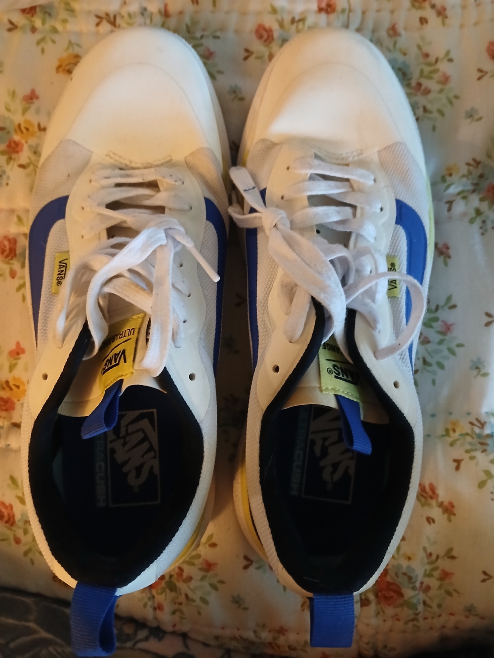 Vans Men’s White Sneakers with Blue Accents